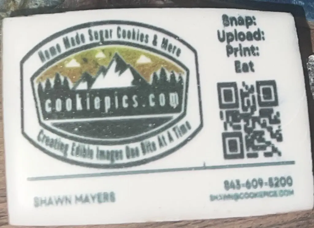 A close up of the back side of a business card.