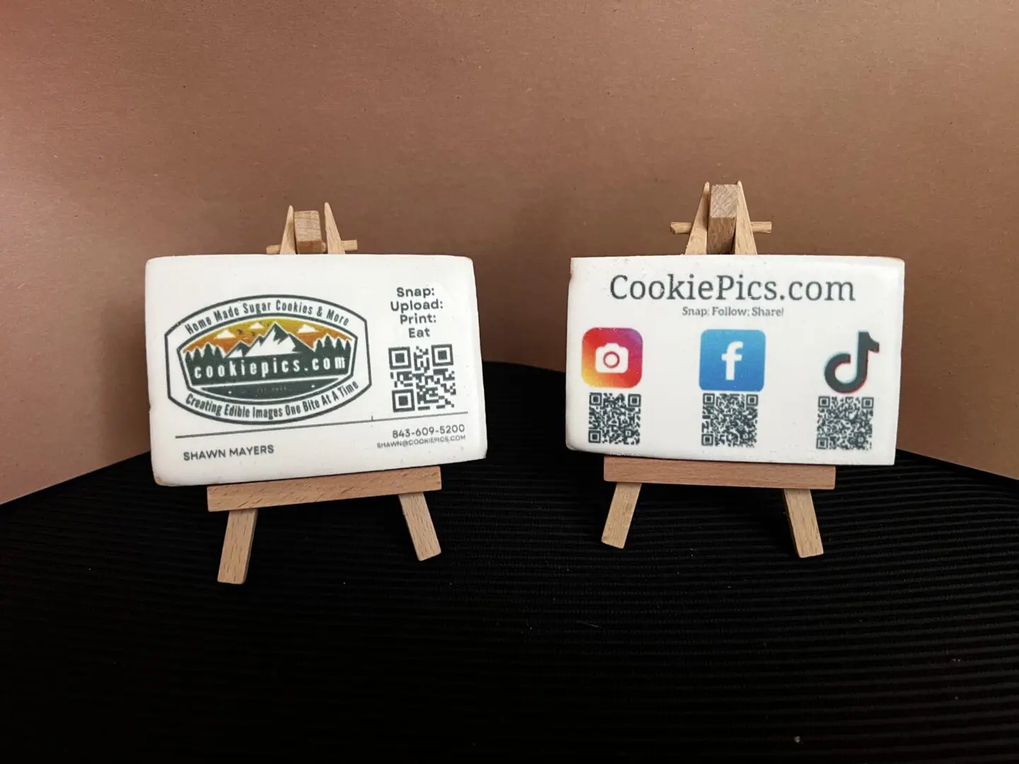 IMG_5973 Business cards on small wooden easels.