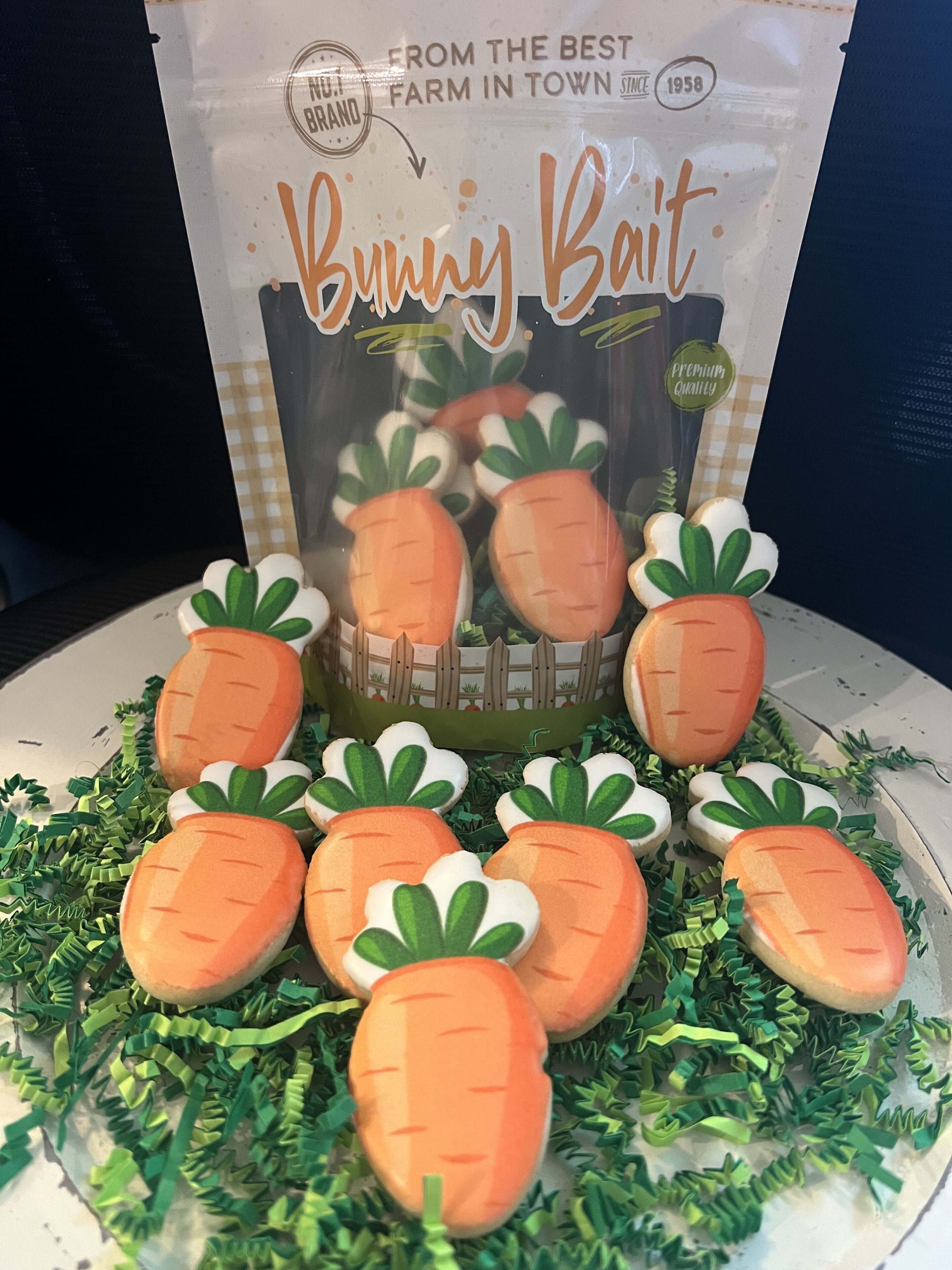 Carrot-shaped cookies with "Bunny Bait" packaging.