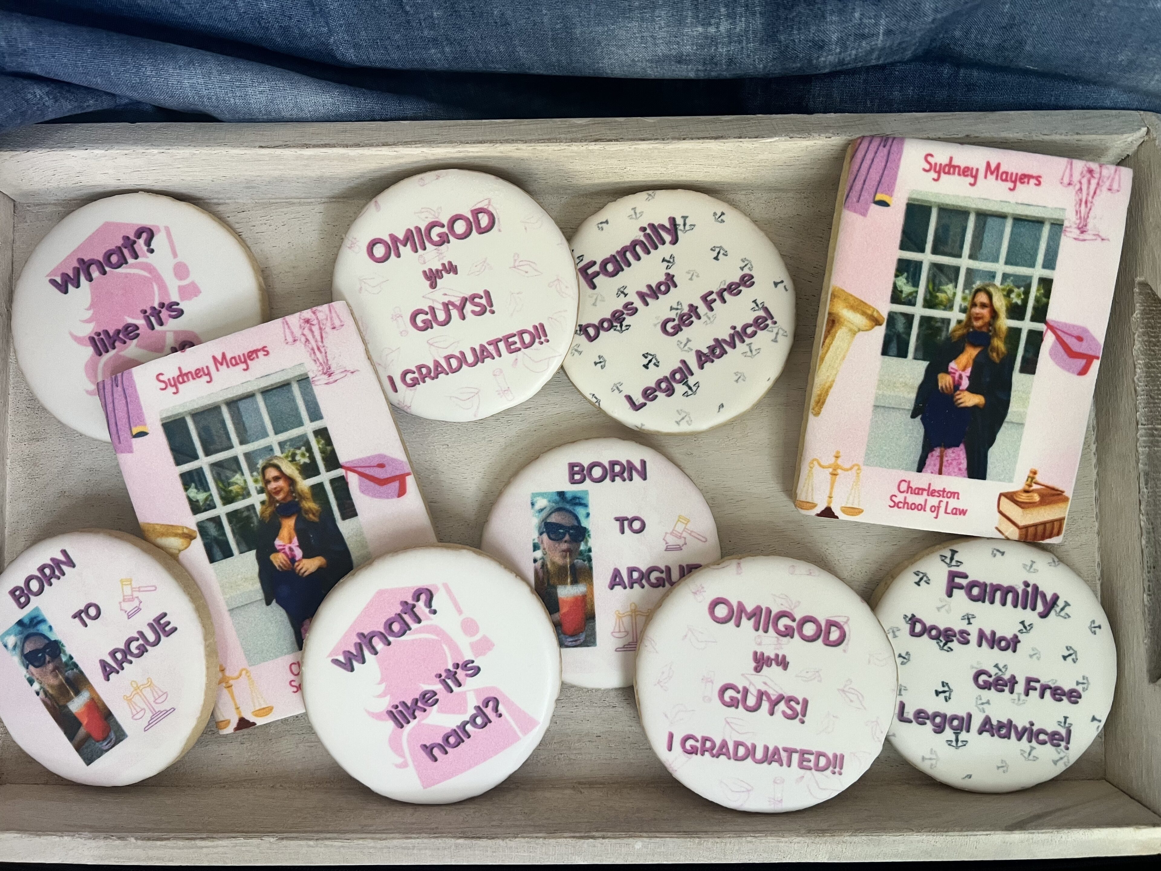 Graduation-themed cookies and photo display.