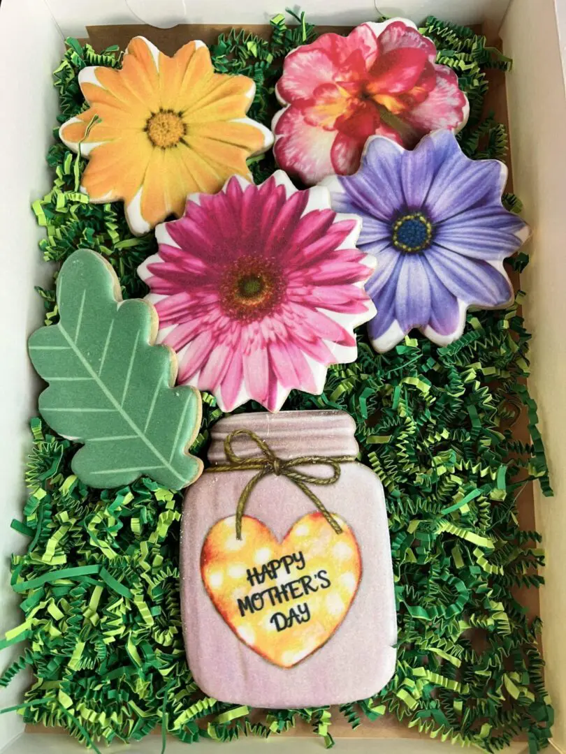 Flower cookies with "Happy Mother's Day" message.